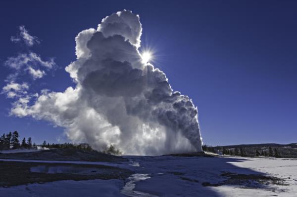 Old Faithful in winter at Yellowstone Natio<em></em>nal Park.