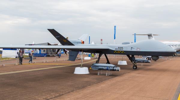 a side view of an MQ-9B SkyGuardian military drone